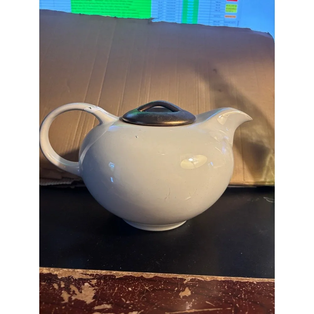 Vintage look stoneware Teapot With Bronze Colored Lid.